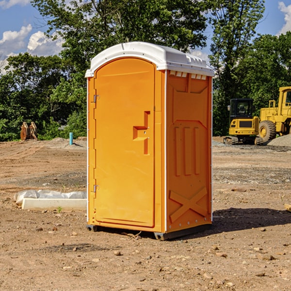 how often are the portable restrooms cleaned and serviced during a rental period in Walton